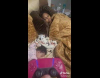 Woman wake up hear playstation controller sound