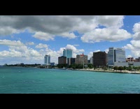 Boat blue river water high rise buildings