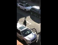 Guy talks into microphone about white house