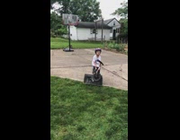 Kid rides bike up ramp gets stuck