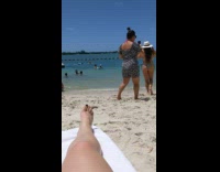 Woman hold hat black white bikini beach