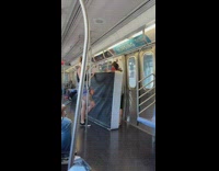 two girls with mattress on train