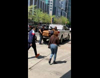 Collab winy - Men load casket on a pickup truck