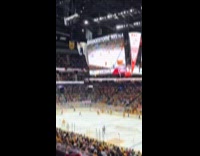 Man laughing at ice sausage biscuit