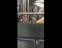 Collab Subway Creatures - Man plays with blue clear crystal balls and rolls them in hands on metro train