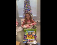 Two girls receive iPhone and hugs mother