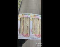 Guy give homeless man a sandwich on the street