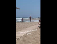 Girl bikini jump shot beach hut umbrella