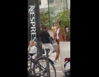 Woman gold onesie put cloth over head