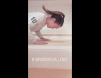 Girl does 10 push ups on wall