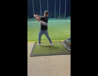 Guy swings golf club falls on butt 