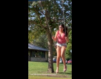 Woman jumps from swing and fell down