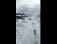 Drone shot aftermath of snowstorm neighborhood street
