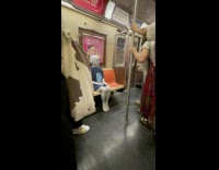 Alien ride and sit in subway train