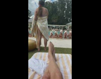 Group girls sunglasses towel on head pool