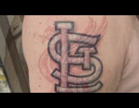 Collab DailyDoseOfInternet - Picture of tattoos with a stitched pattern