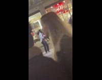 Guy white coat music video street night