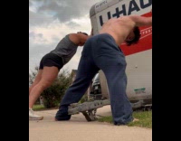 Siblings stop U-Haul trailer on driveway