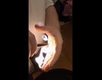 Guy holding lighter lights hand on fire 