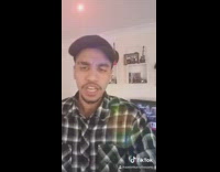 Black white flannel shirt guy throws phone 