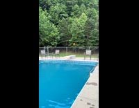 Pickleball girl jumps in pool