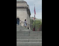 Girl grey suit dress pose stairs museum