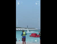 Guy flies and spins on fly board 