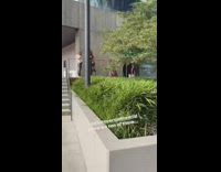 girl gym clothes jump grey wall