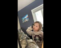 Little girl uses calculator as phone