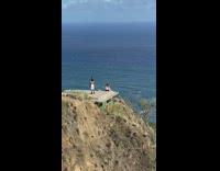 Man and woman take selfies at the old lookout