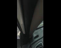 shiny green plastic car driving in street