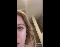 Girl gets ready to shower guy window 