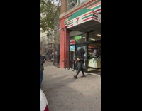 Guy walks with a grill on his head