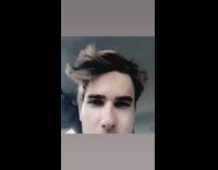 Guy runs fingers through hair car reverse 