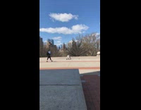 Guy white pants push up exercise park