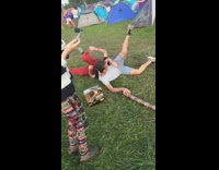 guys on top of friends shoulders running towards one another one falls