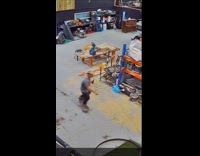 Man rides skateboard while he hold his beer 