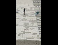 Brown pants girl tiktok dances courtyard guy 