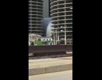 Girl white long sleeves black vest bridge