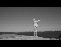 Lady spins in circle while filming herself