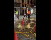 Collab WINY - Construction worker use hose wash head of woman