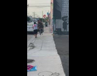 Two guys music video red striped shirt