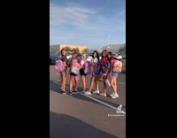 teenagers pose with their senior year back packs