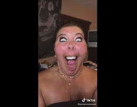 Girl stops smiling and makes funny face 