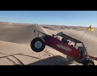 Dune buggy jump in the desert