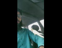 Cockatiel bird play with beard of man