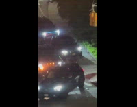 Truck blocking exit cars drive thru sidewalk