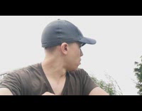 Bird land on shoulder of guy outside