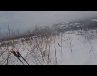 Snowboarder attempts multiple flips but fails landing