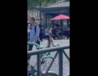 Woman bends on the ground and struts away